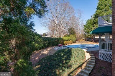 An Exquisite Brick Beauty with Breathtaking Golf Course Views, a on Hamilton Mill Golf Club in Georgia - for sale on GolfHomes.com, golf home, golf lot