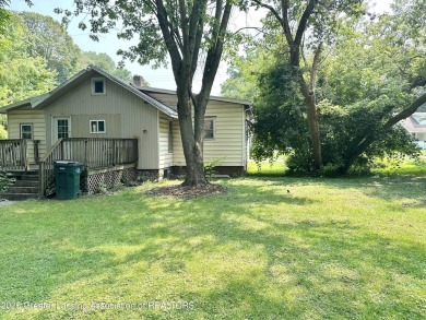 This 2 bed 1 bath home is waiting for you and your vision to on Groesbeck Municipal Golf Course in Michigan - for sale on GolfHomes.com, golf home, golf lot