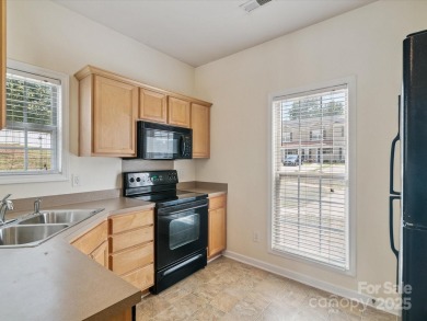 Spacious 2-bedroom, 2.5-bath end-unit townhouse. The inviting on Charles T. Myers Golf Course in North Carolina - for sale on GolfHomes.com, golf home, golf lot