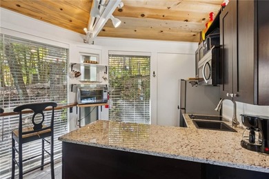 Experience tranquility and breathtaking views at this on Big Canoe Golf Club - Cherokee in Georgia - for sale on GolfHomes.com, golf home, golf lot