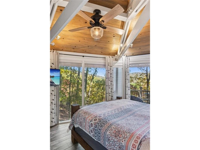 Experience tranquility and breathtaking views at this on Big Canoe Golf Club - Cherokee in Georgia - for sale on GolfHomes.com, golf home, golf lot