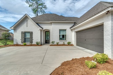 Better than new. This home has barely been lived in. Great open on Lake Caroline Golf Club in Mississippi - for sale on GolfHomes.com, golf home, golf lot