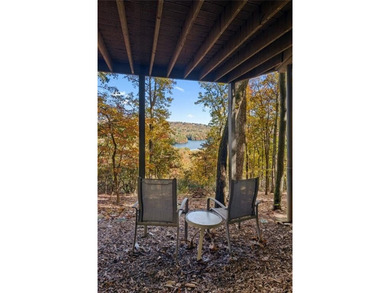 Experience tranquility and breathtaking views at this on Big Canoe Golf Club - Cherokee in Georgia - for sale on GolfHomes.com, golf home, golf lot