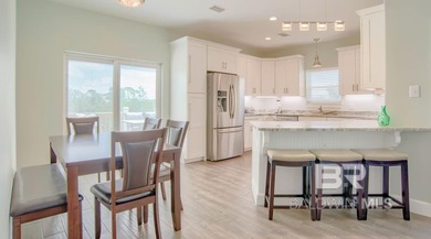 Exquisite Gold Fortified Coastal Retreat in Fort Morgan's on Kiva Dunes Golf Club in Alabama - for sale on GolfHomes.com, golf home, golf lot