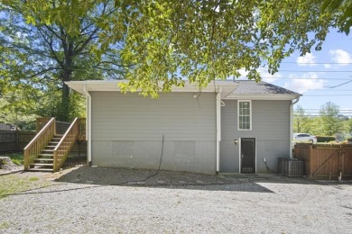 Discover this charming updated home with an incredible view of on John A. White Golf Course in Georgia - for sale on GolfHomes.com, golf home, golf lot