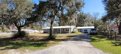 If a MOTIVATED SELLER and location are a must for you, this on Chiefland Golf and Country Club in Florida - for sale on GolfHomes.com, golf home, golf lot