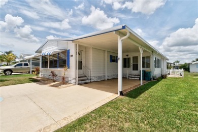 I LOVE THIS HOME! Over 1,300 sq. ft. of comfort and charm. Enjoy on Barefoot Bay Golf Course in Florida - for sale on GolfHomes.com, golf home, golf lot