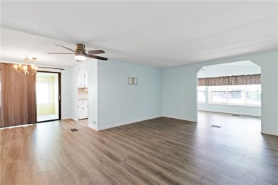 I LOVE THIS HOME! Over 1,300 sq. ft. of comfort and charm. Enjoy on Barefoot Bay Golf Course in Florida - for sale on GolfHomes.com, golf home, golf lot