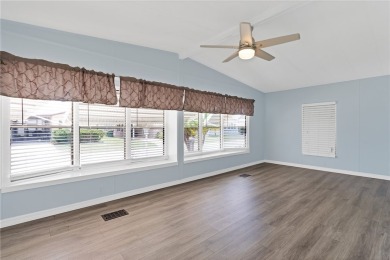 I LOVE THIS HOME! Over 1,300 sq. ft. of comfort and charm. Enjoy on Barefoot Bay Golf Course in Florida - for sale on GolfHomes.com, golf home, golf lot