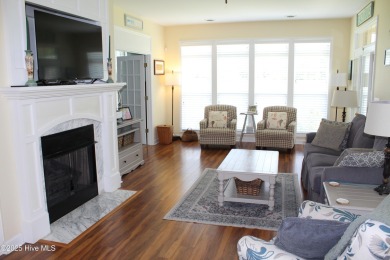 YOU WILL DISCOVER TRANQUIL POND VIEWS & COASTAL COMFORT IN THIS on Ocean Ridge Plantation in North Carolina - for sale on GolfHomes.com, golf home, golf lot