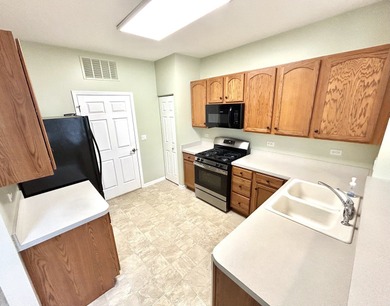Welcome to this Beautiful *Laguna* Model Ranch Townhome in on Carillon Lakes 3 Hole Course in Illinois - for sale on GolfHomes.com, golf home, golf lot