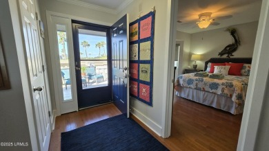 Before stepping into this beautiful 2BR/2BA Sanddown home, pause on Ocean Creek Golf Course in South Carolina - for sale on GolfHomes.com, golf home, golf lot