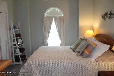 YOU WILL DISCOVER TRANQUIL POND VIEWS & COASTAL COMFORT IN THIS on Ocean Ridge Plantation in North Carolina - for sale on GolfHomes.com, golf home, golf lot