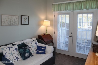 YOU WILL DISCOVER TRANQUIL POND VIEWS & COASTAL COMFORT IN THIS on Ocean Ridge Plantation in North Carolina - for sale on GolfHomes.com, golf home, golf lot