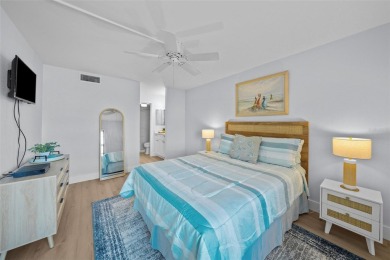 Casa Del Mar Villa.  With stunning water views, this first floor on Isla Del Sol Yacht and Country Club in Florida - for sale on GolfHomes.com, golf home, golf lot