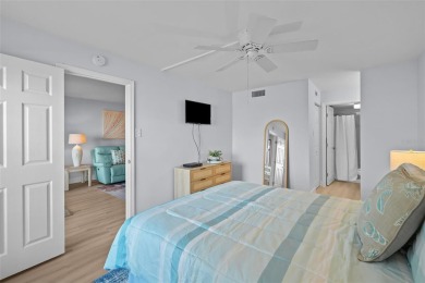 Casa Del Mar Villa.  With stunning water views, this first floor on Isla Del Sol Yacht and Country Club in Florida - for sale on GolfHomes.com, golf home, golf lot