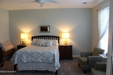 YOU WILL DISCOVER TRANQUIL POND VIEWS & COASTAL COMFORT IN THIS on Ocean Ridge Plantation in North Carolina - for sale on GolfHomes.com, golf home, golf lot