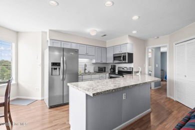 This beautifully maintained, open-concept condo is a must-see! on Possum Trot Golf Course in South Carolina - for sale on GolfHomes.com, golf home, golf lot