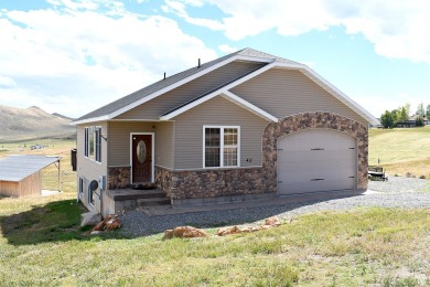 A perfect getaway, or an ideal investment property. Whatever on Bear Lake Golf Course in Utah - for sale on GolfHomes.com, golf home, golf lot
