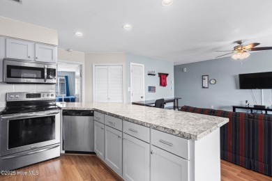 This beautifully maintained, open-concept condo is a must-see! on Possum Trot Golf Course in South Carolina - for sale on GolfHomes.com, golf home, golf lot