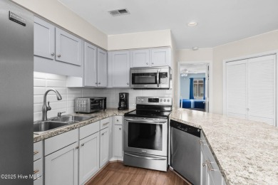 This beautifully maintained, open-concept condo is a must-see! on Possum Trot Golf Course in South Carolina - for sale on GolfHomes.com, golf home, golf lot
