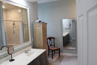 YOU WILL DISCOVER TRANQUIL POND VIEWS & COASTAL COMFORT IN THIS on Ocean Ridge Plantation in North Carolina - for sale on GolfHomes.com, golf home, golf lot