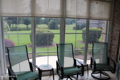 YOU WILL DISCOVER TRANQUIL POND VIEWS & COASTAL COMFORT IN THIS on Ocean Ridge Plantation in North Carolina - for sale on GolfHomes.com, golf home, golf lot