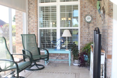 YOU WILL DISCOVER TRANQUIL POND VIEWS & COASTAL COMFORT IN THIS on Ocean Ridge Plantation in North Carolina - for sale on GolfHomes.com, golf home, golf lot