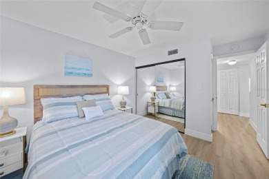 Casa Del Mar Villa.  With stunning water views, this first floor on Isla Del Sol Yacht and Country Club in Florida - for sale on GolfHomes.com, golf home, golf lot