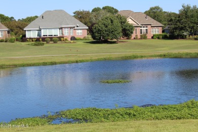 YOU WILL DISCOVER TRANQUIL POND VIEWS & COASTAL COMFORT IN THIS on Ocean Ridge Plantation in North Carolina - for sale on GolfHomes.com, golf home, golf lot