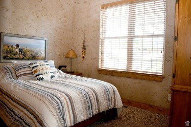 A perfect getaway, or an ideal investment property. Whatever on Bear Lake Golf Course in Utah - for sale on GolfHomes.com, golf home, golf lot