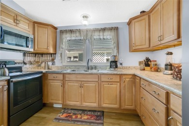 Under contract-accepting backup offers. Seller offering up to a on Lake Henry Golf Club in Florida - for sale on GolfHomes.com, golf home, golf lot
