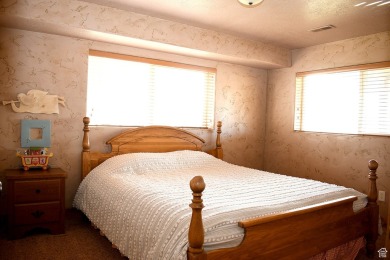 A perfect getaway, or an ideal investment property. Whatever on Bear Lake Golf Course in Utah - for sale on GolfHomes.com, golf home, golf lot