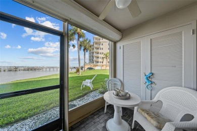 Casa Del Mar Villa.  With stunning water views, this first floor on Isla Del Sol Yacht and Country Club in Florida - for sale on GolfHomes.com, golf home, golf lot