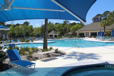 YOU WILL DISCOVER TRANQUIL POND VIEWS & COASTAL COMFORT IN THIS on Ocean Ridge Plantation in North Carolina - for sale on GolfHomes.com, golf home, golf lot