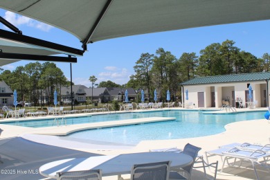 YOU WILL DISCOVER TRANQUIL POND VIEWS & COASTAL COMFORT IN THIS on Ocean Ridge Plantation in North Carolina - for sale on GolfHomes.com, golf home, golf lot