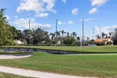 Casa Del Mar Villa.  With stunning water views, this first floor on Isla Del Sol Yacht and Country Club in Florida - for sale on GolfHomes.com, golf home, golf lot