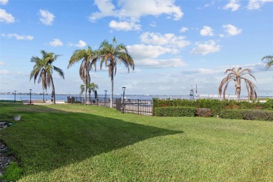 Casa Del Mar Villa.  With stunning water views, this first floor on Isla Del Sol Yacht and Country Club in Florida - for sale on GolfHomes.com, golf home, golf lot