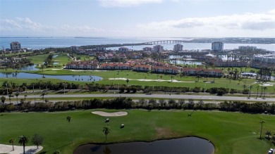 Casa Del Mar Villa.  With stunning water views, this first floor on Isla Del Sol Yacht and Country Club in Florida - for sale on GolfHomes.com, golf home, golf lot