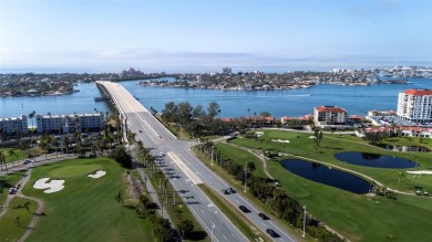 Casa Del Mar Villa.  With stunning water views, this first floor on Isla Del Sol Yacht and Country Club in Florida - for sale on GolfHomes.com, golf home, golf lot