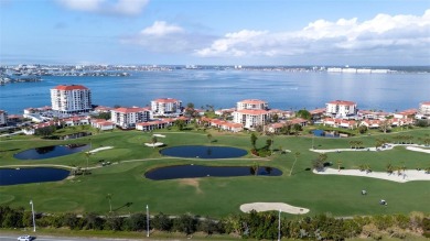 Casa Del Mar Villa.  With stunning water views, this first floor on Isla Del Sol Yacht and Country Club in Florida - for sale on GolfHomes.com, golf home, golf lot