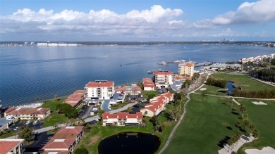 Casa Del Mar Villa.  With stunning water views, this first floor on Isla Del Sol Yacht and Country Club in Florida - for sale on GolfHomes.com, golf home, golf lot