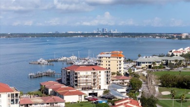 Casa Del Mar Villa.  With stunning water views, this first floor on Isla Del Sol Yacht and Country Club in Florida - for sale on GolfHomes.com, golf home, golf lot