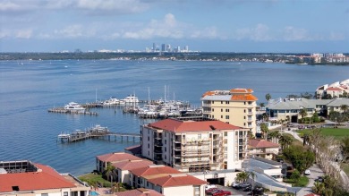 Casa Del Mar Villa.  With stunning water views, this first floor on Isla Del Sol Yacht and Country Club in Florida - for sale on GolfHomes.com, golf home, golf lot
