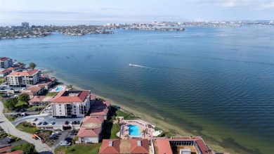 Casa Del Mar Villa.  With stunning water views, this first floor on Isla Del Sol Yacht and Country Club in Florida - for sale on GolfHomes.com, golf home, golf lot