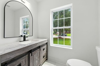 This home may qualify for a BELOW MARKET INTEREST RATE-starting on John A. White Golf Course in Georgia - for sale on GolfHomes.com, golf home, golf lot