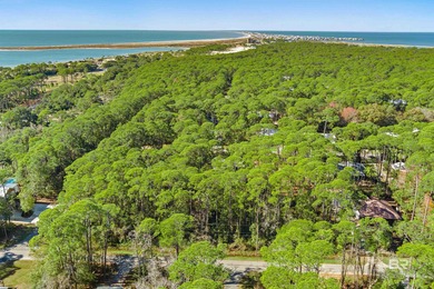 Beautiful wooded residential lot on Dauphin Island, measuring on Isle Dauphine Club Golf Course in Alabama - for sale on GolfHomes.com, golf home, golf lot