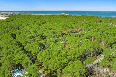 Beautiful wooded residential lot on Dauphin Island, measuring on Isle Dauphine Club Golf Course in Alabama - for sale on GolfHomes.com, golf home, golf lot