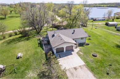 Because there's no such thing as, *too much of a good thing,* on Stalker Lake Golf Course in Minnesota - for sale on GolfHomes.com, golf home, golf lot