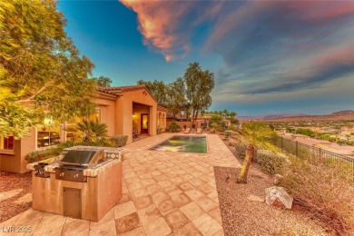 This beautiful single-story home is perched at the summit of the on  in Nevada - for sale on GolfHomes.com, golf home, golf lot